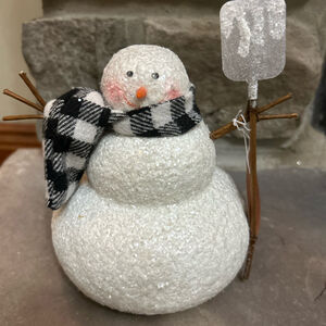 Snowman with shovel Ragon House